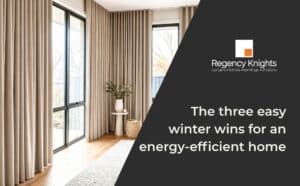 Layered curtains and blinds insulating a Canberra living room window in winter