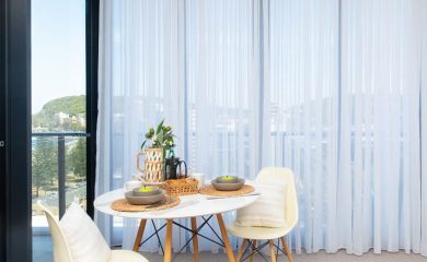 Custom curtains Canberra Custom curtains installed in a Canberra living room for privacy and style.